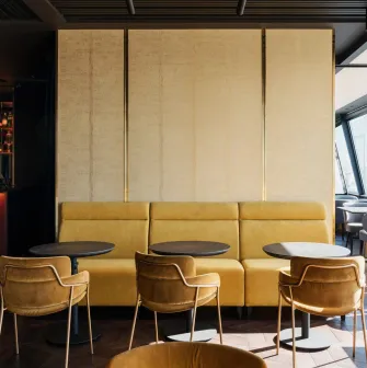 11 Mirrors Restaurant & Bar - seating area with large mirror and window