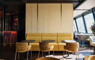 11 Mirrors Restaurant & Bar - seating area with large mirror and window