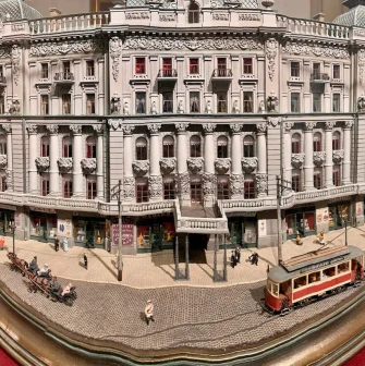 Muzei Istorii Mista Kyieva in Kyiv - detailed miniature architectural model of a grand historical building with a vintage tram in front