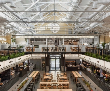 Kyiv Food Market main hall with wooden tables