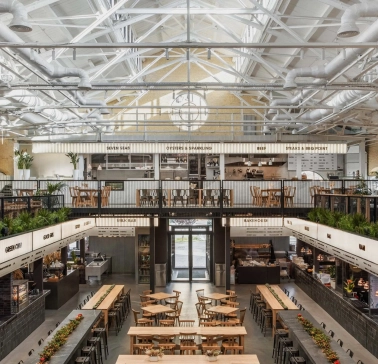 Kyiv Food Market main hall with wooden tables