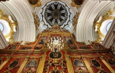 Decorated ceiling and central chandelier above the iconostasis in St. Andrew's Church in Kyiv