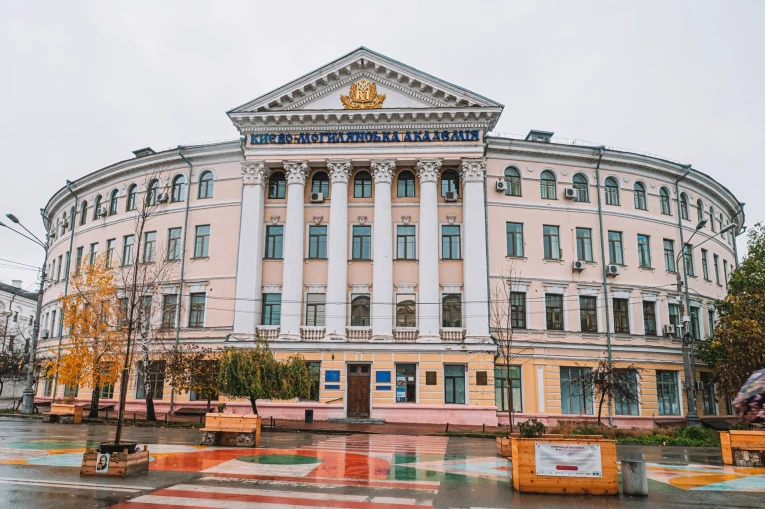 Kyiv-Mohyla Academy in Kyiv - historic building facing the rainy square