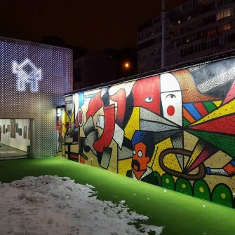 TSM m17 - colorful outdoor paved area next to the building