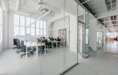 Meeting room behind a glass partition at Kooperativ in Kyiv