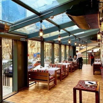 Glass terrace of the Musafir restaurant in Kyiv