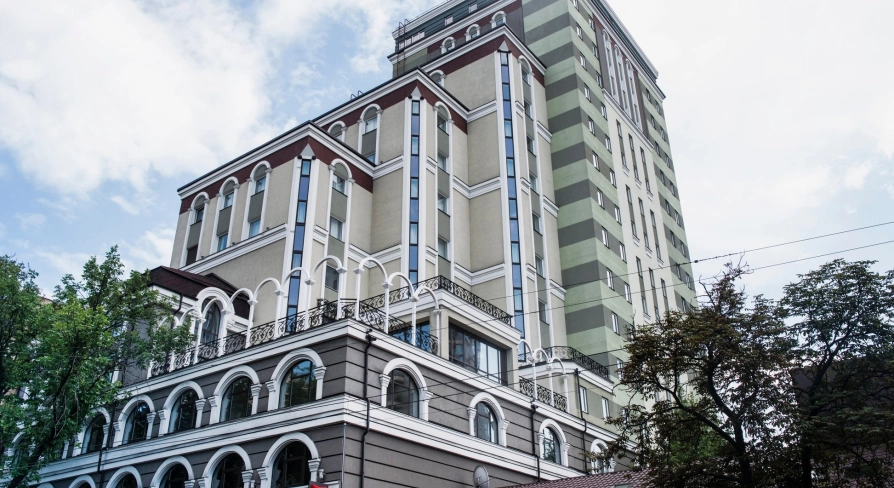 Ibis Railway Station in Kyiv - tall hotel building facade with arched windows