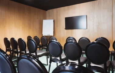 IQ Hotel - clean, modern conference hall ready for a professional meeting