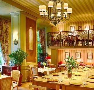 Elegantly decorated interior of La Veranda restaurant in Kyiv