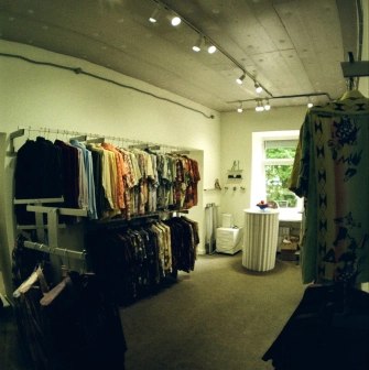 The hall of the Konyk.dept store with clothes hangers and a minimalist interior