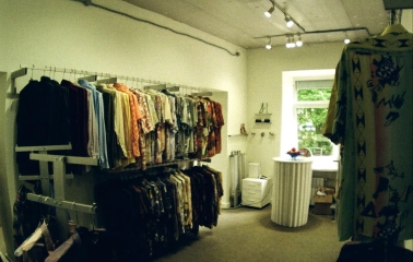 The hall of the Konyk.dept store with clothes hangers and a minimalist interior