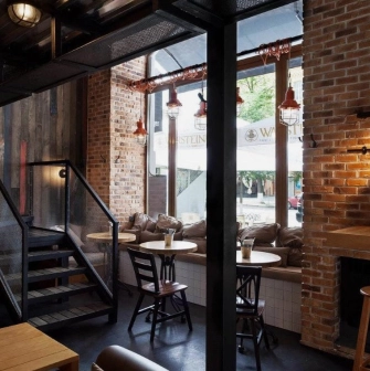True Burger Bar - spacious dining area positioned right next to a large window