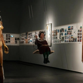 TSM m17 - large, decorative rope swing installation inside an exhibition hall