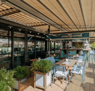 Summer terrace of Milk Bar TSUM restaurant in the center of Kyiv