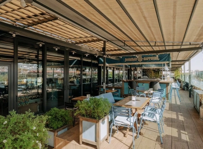 Summer terrace of Milk Bar TSUM restaurant in the center of Kyiv