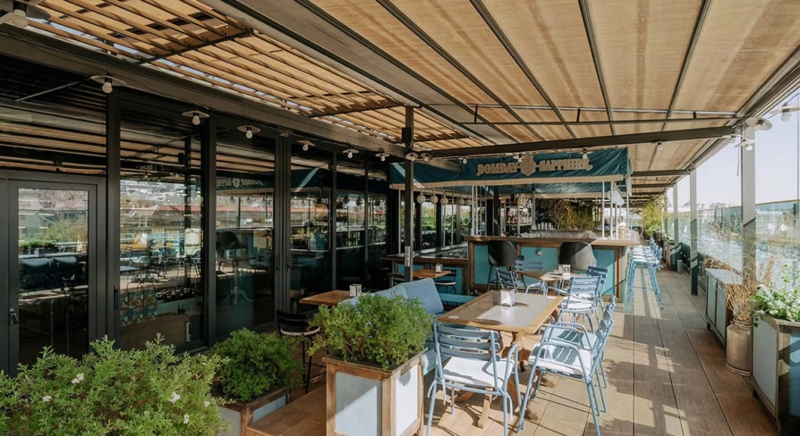 Summer terrace of Milk Bar TSUM restaurant in the center of Kyiv