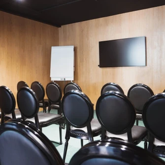 IQ Hotel - clean, modern conference hall ready for a professional meeting