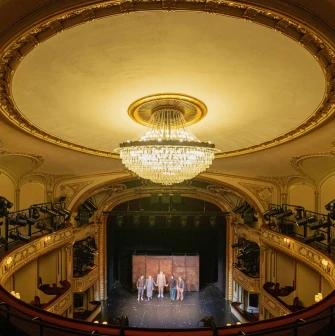 Teatr Franka in Kyiv - grand view from the upper circle looking down past a massive crystal chandelier onto the stage