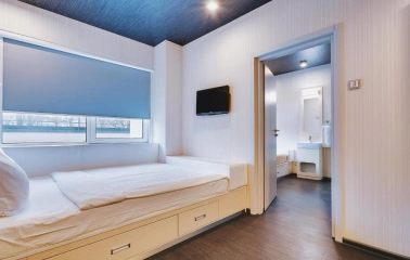 Bright single room at the IQ Hotel in Kyiv with minimalist design