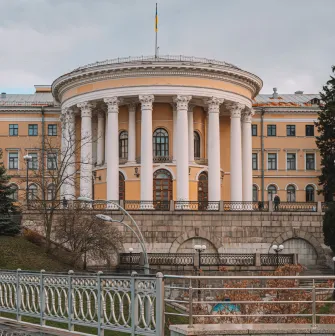 October Palace in Kyiv - exterior view of the yellow rotunda with white columns