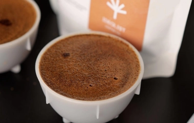 Idealist Coffee - close-up of a cup of freshly brewed coffee