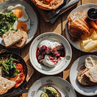 Octo Tower - breakfast table with eggs toast croissant and yogurt