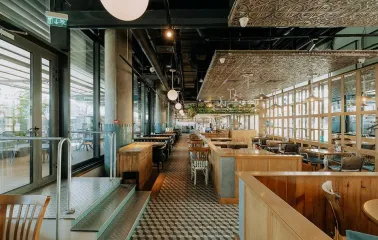 View of the Milk Bar terrace in TSUM through panoramic windows