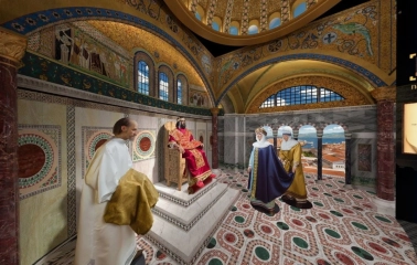 Muzei Stanovlennia Ukrainskoi Natsii in Kyiv - magnificent Byzantine throne hall reconstruction with a prince seated in red robes receiving visitors