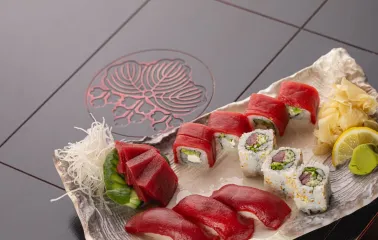 Assorted sushi and sashimi on a platter at Fujiwara Yoshi restaurant in Kyiv
