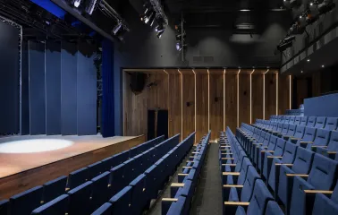 Teatr na Podoli in Kyiv - empty modern stage with blue velvet seating rows