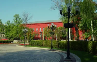 A wrought iron lantern and green area near Shevchenko University in Kyiv