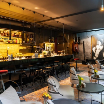 Beatnik Bar - cozy underground interior featuring plush velvet seating and dim lighting