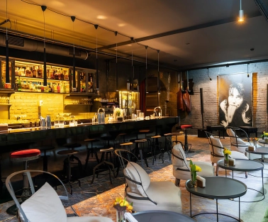 Beatnik Bar - cozy underground interior featuring plush velvet seating and dim lighting