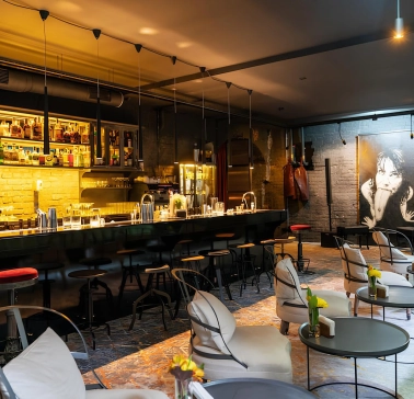 Beatnik Bar - cozy underground interior featuring plush velvet seating and dim lighting