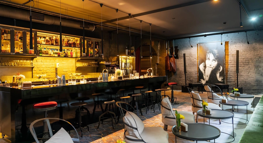 Beatnik Bar - cozy underground interior featuring plush velvet seating and dim lighting