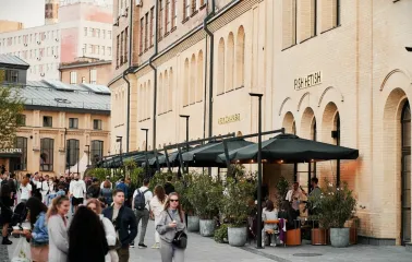 Entrance to Fish Fetish restaurant in Kyiv with terrace and umbrellas