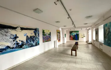 Paintings by contemporary Ukrainian artists in the exhibition hall of the Triptych Gallery in Kyiv