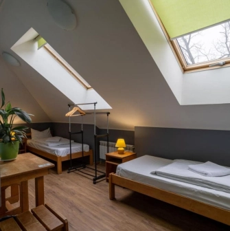Double attic room with two twin beds at Dream Hostel in Kyiv