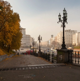 Khreshchatyi Park in Kyiv - view from the stairs with vintage lamps overlooking the city street in autumn