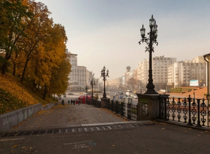 Khreshchatyi Park in Kyiv - view from the stairs with vintage lamps overlooking the city street in autumn