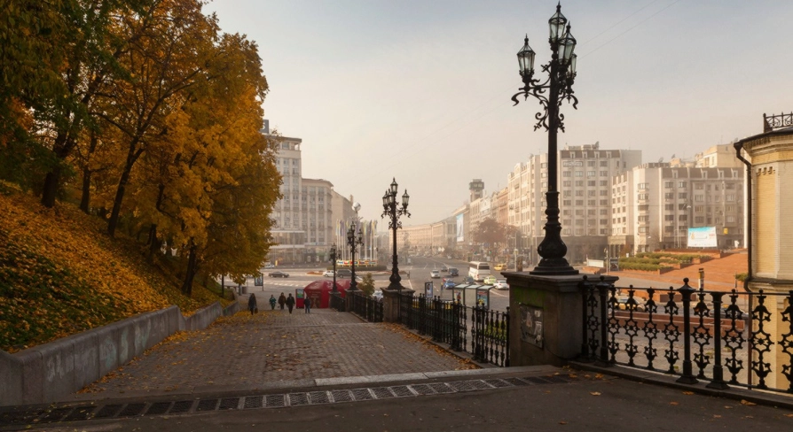 Khreshchatyi Park in Kyiv - view from the stairs with vintage lamps overlooking the city street in autumn