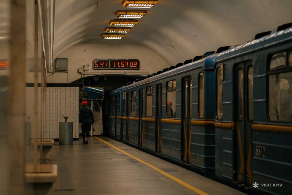 Blue subway car at a Kyiv metro station