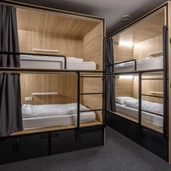 Modern room with capsule bunk beds at Kyiv Hostel in Kyiv