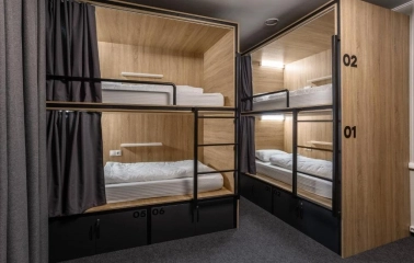 Modern room with capsule bunk beds at Kyiv Hostel in Kyiv