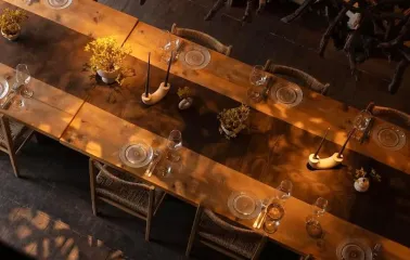 Seliam in Kyiv - view from above at banquet table with candles and branch decor