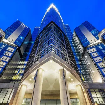 Facade of the Hilton Kyiv hotel in the evening