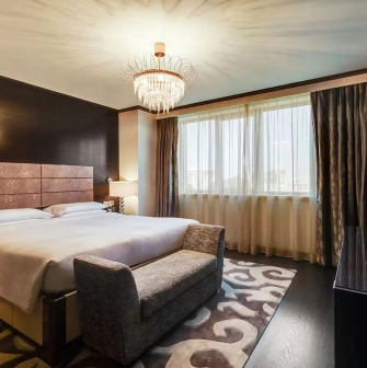 Premium room at Hyatt Regency Kyiv with a king-size bed