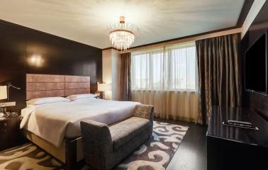 Premium room at Hyatt Regency Kyiv with a king-size bed