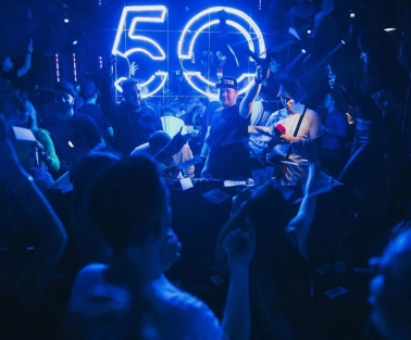Party at the Fifty club in Kyiv with a lot of people and blue lighting