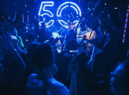 Party at the Fifty club in Kyiv with a lot of people and blue lighting